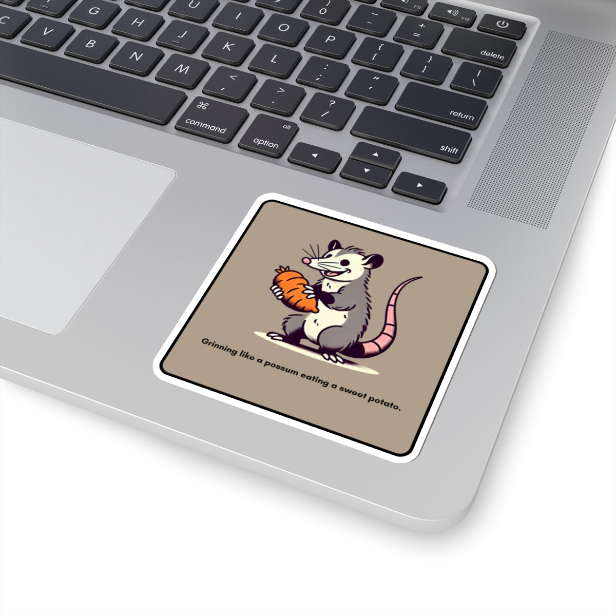 Grinning like a possum eating a sweet potato” Kiss-Cut Sticker
