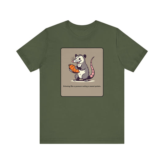 “Happier than a possum eating sweet potatoes” Unisex Short Sleeve Tee